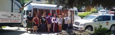 Some of the RPG Research volunteers at Tolkien Moot XIV (2018) in front of the wheelchair accessible RPG Bus, and wheelchair Friendly RPG Trailer.